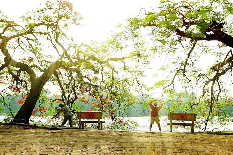 Morning exercise at Hoan Kiem Lake